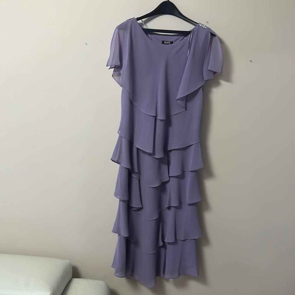 Beautiful dress . Size14. New with tags! Enjoy!